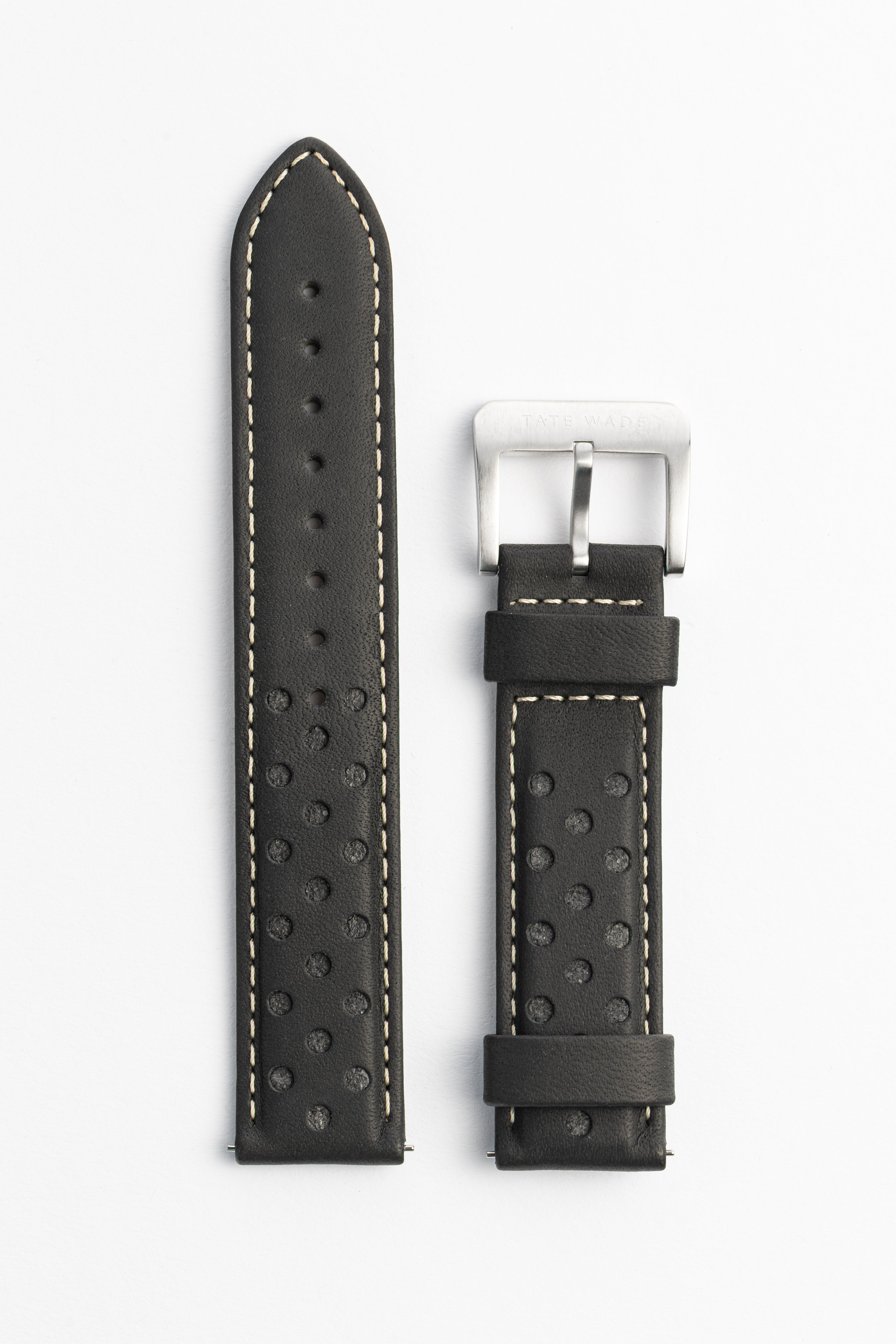 Black perforated leather watch strap with white stitching on a white background