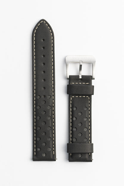 Black perforated leather watch strap with white stitching on a white background